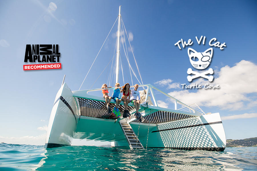 Family sitting on a catamaran with 'Animal Planet Recommended' and 'The VI Cat' logos.